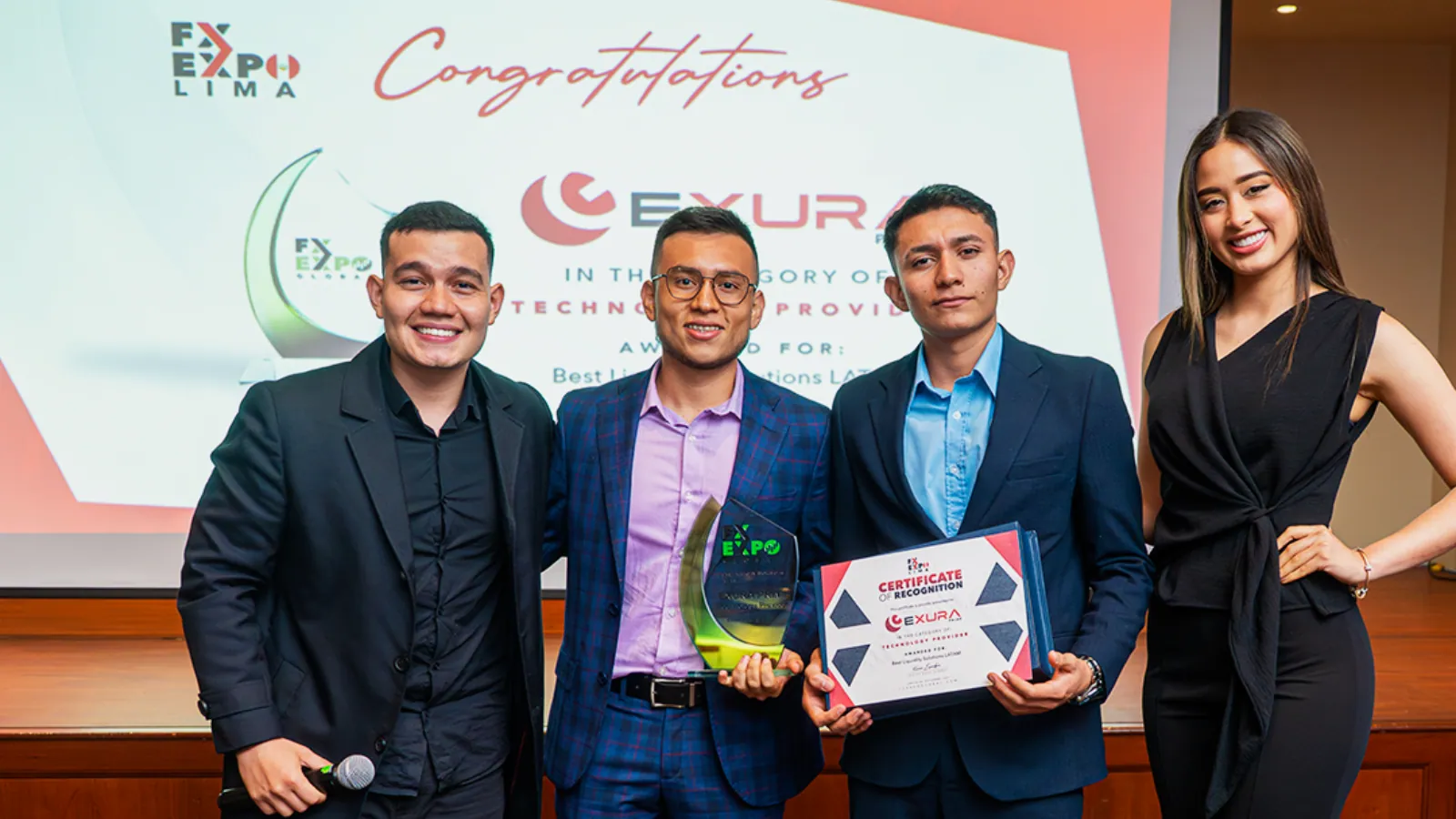 Exura Prime team receiving the Best Liquidity Solutions LATAM award at FX Expo Lima 2025